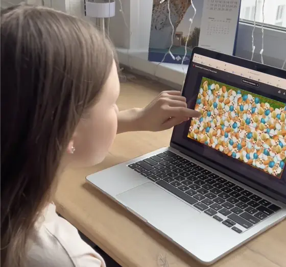 A girl solving a shape sudoku in an online lesson